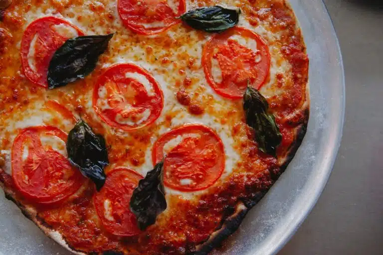 A bowl of spaghetti with marinara sauce, showcasing the ideal consistency and texture of the sauce.