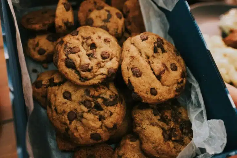 Close-up of moist cookies on a cooling rack, highlighting the secret to their soft texture