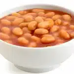 A bowl of cooked navy beans ready to be added to various dishes