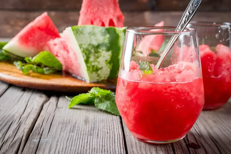 Delicious homemade slushie in a glass with a colorful straw 🥤