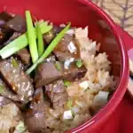 A delicious serving of steak fried rice, featuring tender steak pieces and vibrant vegetables mixed with perfectly cooked rice.